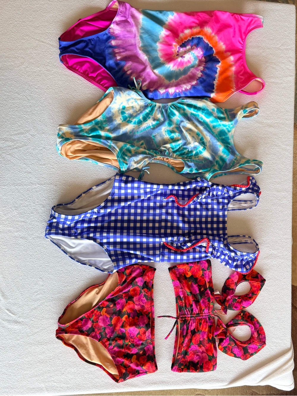 Swimsuit bundle! 4 suits 
*3 one-pieces, 1 two-piece
*3 size 12, 1 size 10/12